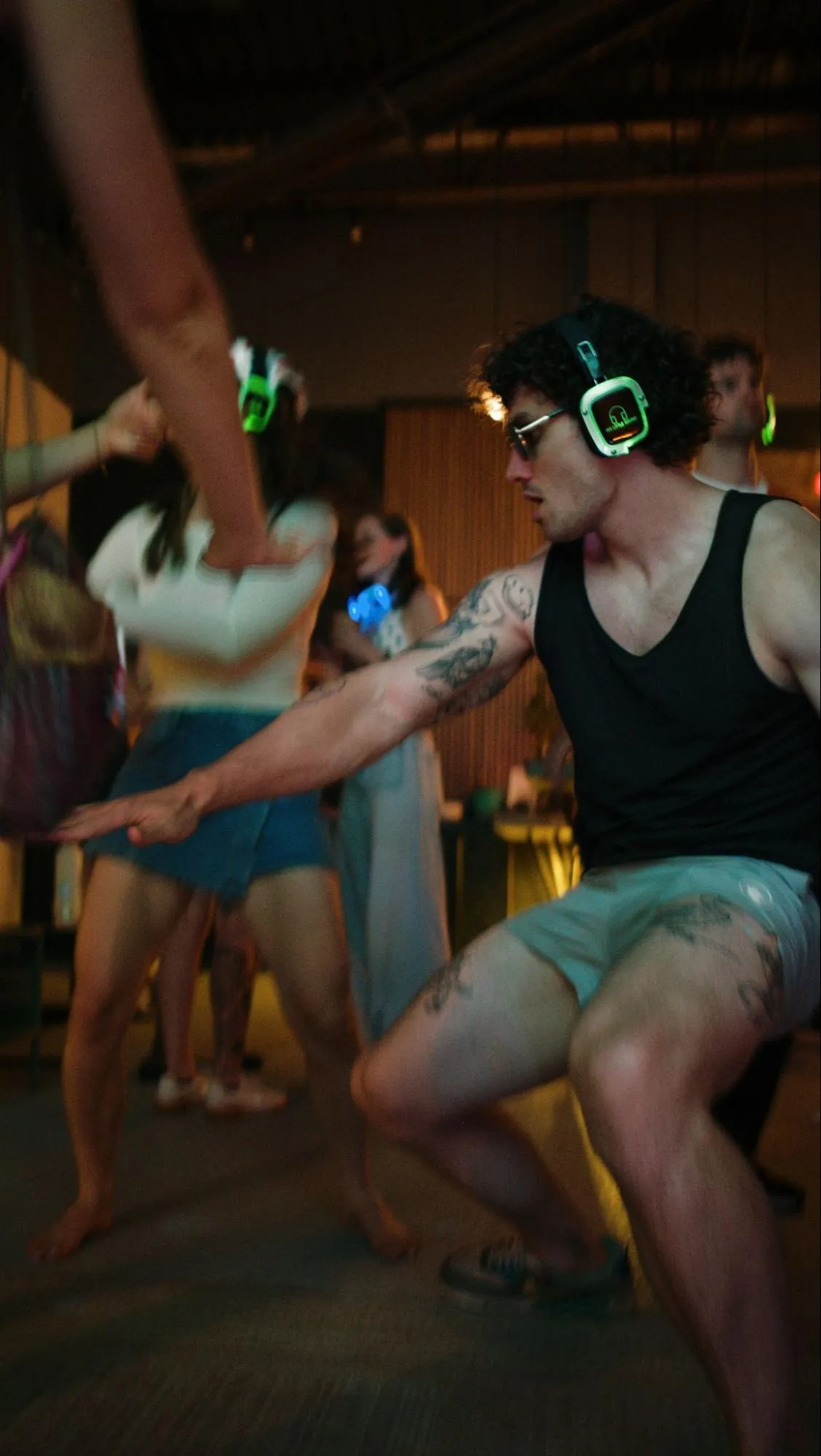 A silent-disco dance party with glowing headphones at Third Space & Co.