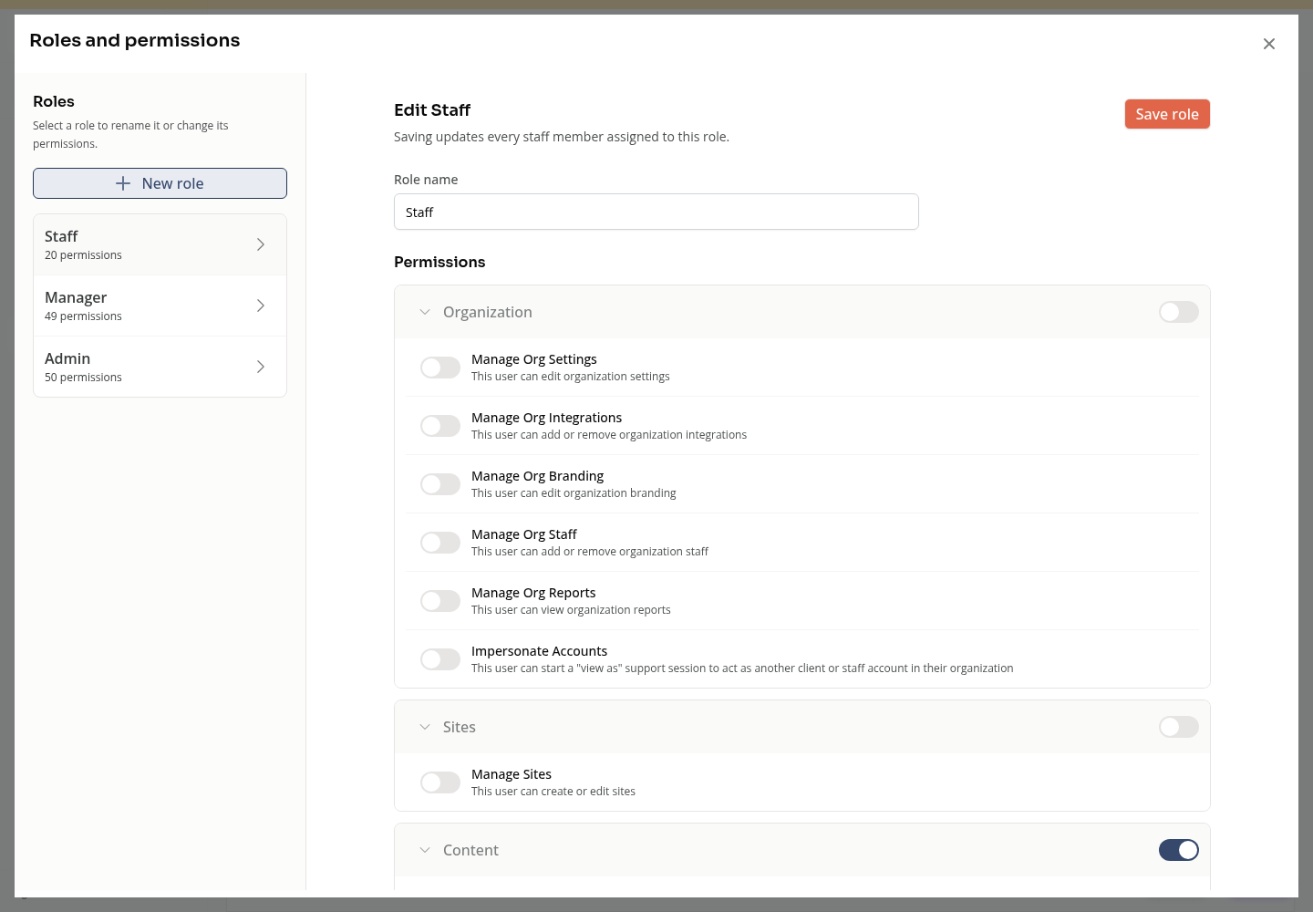 The Roles and permissions editor warning that saving updates every staff member assigned to the role