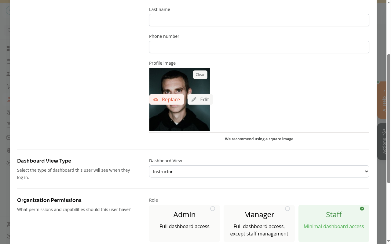 Edit staff member modal showing Dashboard View and Role fields