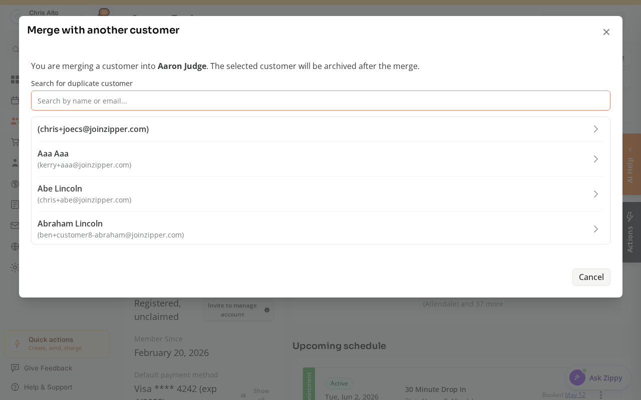 The Merge with another customer modal at the search step